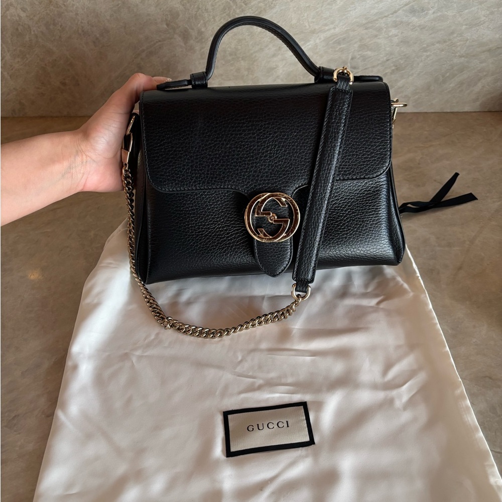 Authentic Gucci Black Leather Satchel with Gold Accents